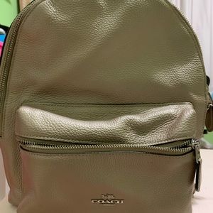Like new gold Coach backpack!